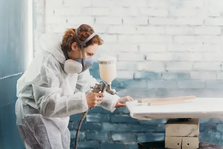 Airless spray painting of steel structure